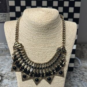 Elegant Gold and Black Statement Necklace
